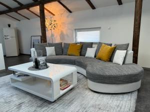 Posezení v ubytování GLEIS 13 - THE LOFT im ehemaligen Lokschuppen