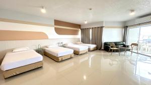 Fotografie z fotogalerie ubytování Markland Beach View v destinaci Pattaya Central + 65 fotografií