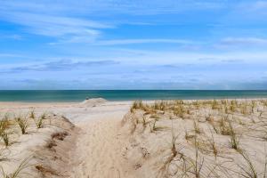a sandy beach with the ocean in the background at Pass-A-Grille Beach Retreat Unit 8 in St. Pete Beach