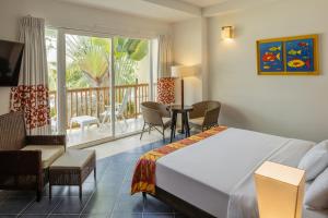 Giường trong phòng chung tại Decameron Barú - All Inclusive +41 ảnh