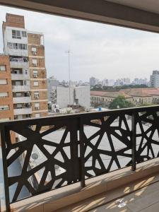a view of a city from a balcony at CoWorking in Corrientes