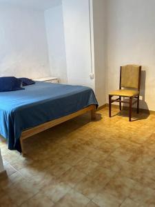 Postel nebo postele na pokoji v ubytování Puigsallança-ye