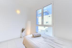 Postel nebo postele na pokoji v ubytování Pool&Beach Apartment Calafell by VM Group + 24 fotografií