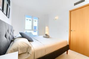 Postel nebo postele na pokoji v ubytování Pool&Beach Apartment Calafell by VM Group