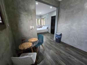 Hotel "Ala Residencias"客房内的一张或多张床位