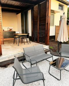 Le perchoir - tiny house avec vue merにあるシーティングエリア