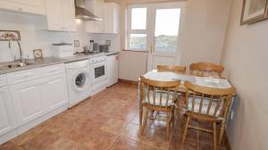 Kuchyň nebo kuchyňský kout v ubytování Breezy Point Accommodation