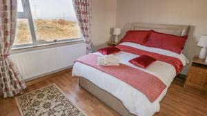 Postel nebo postele na pokoji v ubytování Breezy Point Accommodation