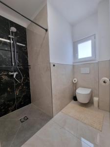 Ένα μπάνιο στο Ferienwohnung Selo A +7 φωτογραφίες