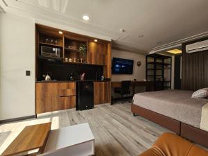 Телевизор и/или развлекательный центр в Apto en Pereira King Hermoso Moderno