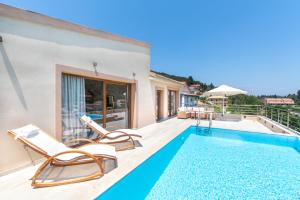 Πισίνα στο ή κοντά στο villa vasillis-heated swimming pool with infinity view