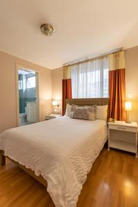 Voodi või voodid majutusasutuse Hotel Sandmelis toas