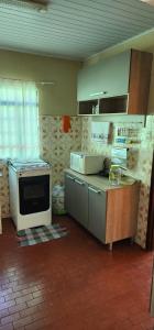 Η κουζίνα ή μικρή κουζίνα στο Casa e Conforto