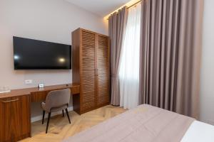 TV a/nebo společenská místnost v ubytování Hotel Vila 101-New Bazaar