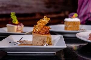 a piece of dessert on a plate on a table at Best Western Plus Hotel Stofella in Guatemala +65 photos