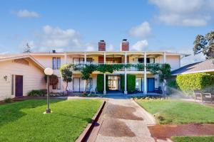 a large white house with a yard at Silverado Resort and Spa 271 & 272 in Napa