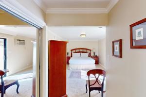 a bedroom with a bed and a table and chairs at Silverado Resort and Spa 271 & 272 in Napa +43 photos