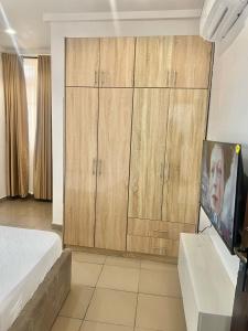 Μια τηλεόραση ή/και κέντρο ψυχαγωγίας στο Lovely and cozy studio in Wuye