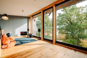 Ένα ή περισσότερα κρεβάτια σε δωμάτιο στο Ferienhaus-Haus-Uebersee