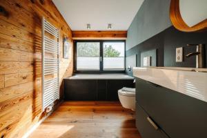 Ένα μπάνιο στο Ferienhaus-Haus-Uebersee +34 φωτογραφίες