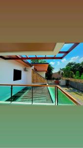 a view from the balcony of a house at Luxury Pool 4mins WALKING STREET AND Friendship Highway in Angeles
