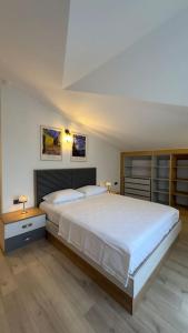 Ένα ή περισσότερα κρεβάτια σε δωμάτιο στο Kemer Plumeria Villas C1