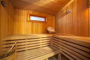 a wooden cabin with a sauna with a window at Cheers Lighthouse in Istanbul