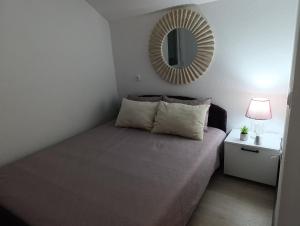 En eller flere senge i et værelse på VA vikendica Tesanj