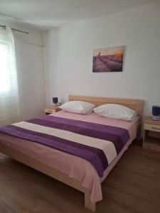 Postel nebo postele na pokoji v ubytování Apartment Drace 4550a + 17 fotografií