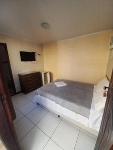 Cama ou camas em um quarto em Pousada Roça Velha