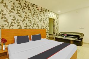 Super Collection O Mountain View Resort客房内的一张或多张床位