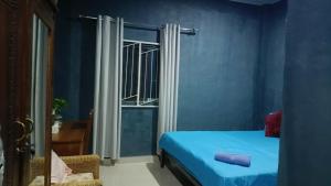 Uma cama ou camas num quarto em Gama Apartments