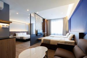 Voodi või voodid majutusasutuse 56 Hotel toas
