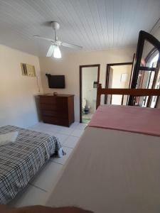 Cama ou camas em um quarto em Pousada Roça Velha