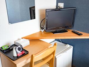 TV a/nebo společenská místnost v ubytování CHALET BURLAP FURANUI