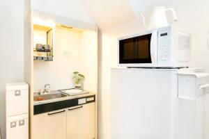 Η κουζίνα ή μικρή κουζίνα στο FIKA Shibuya Honmachi 201