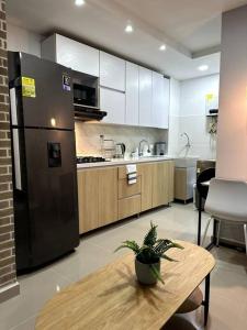 Kuchyň nebo kuchyňský kout v ubytování Hermoso Apartamento Entero