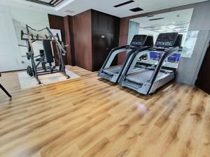 O centro de fitness e/ou as comodidades de fitness de 丽呈東谷酒店保定客运中心店