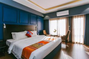 Postel nebo postele na pokoji v ubytování Sapa Charm Hotel + 51 fotografií