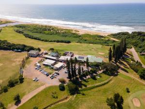 an aerial view of a resort near the ocean at 304 Amazibu- Luxury On the Beach in Amanzimtoti