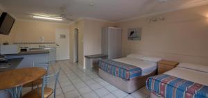 Kuchyň nebo kuchyňský kout v ubytování Cairns Holiday Lodge