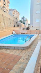 a large swimming pool in the middle of a building at Galatea Arena in Arenales del Sol