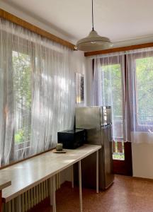 TV a/nebo společenská místnost v ubytování Apartment s terasou Lysá + 10 fotografií