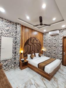 Voodi või voodid majutusasutuse Hotel GS Grand Amritsar toas