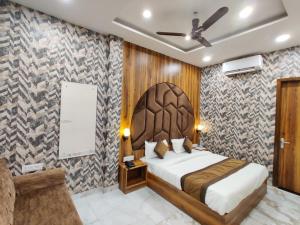 Voodi või voodid majutusasutuse Hotel GS Grand Amritsar toas
