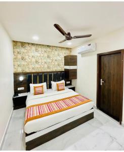 Voodi või voodid majutusasutuse Hotel GS Grand Amritsar toas