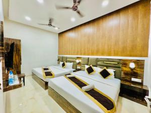Voodi või voodid majutusasutuse Hotel GS Grand Amritsar toas