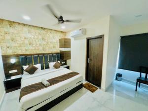 Voodi või voodid majutusasutuse Hotel GS Grand Amritsar toas