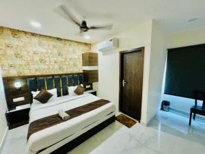 Voodi või voodid majutusasutuse Hotel GS Grand Amritsar toas