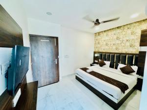 Voodi või voodid majutusasutuse Hotel GS Grand Amritsar toas